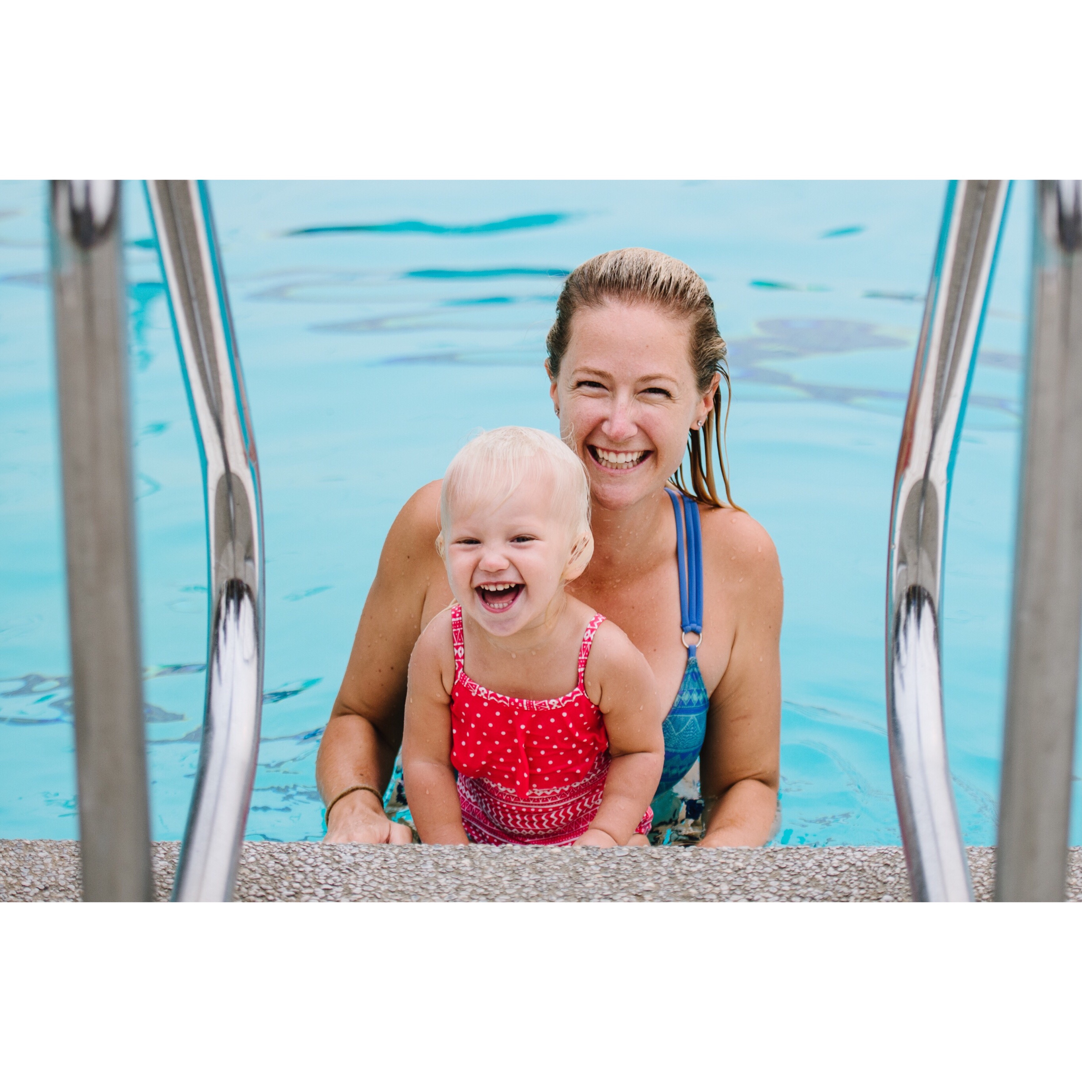 Swim instructor and baby smiling in the pool